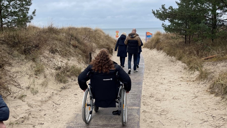 with an wheelchair visiting the beach